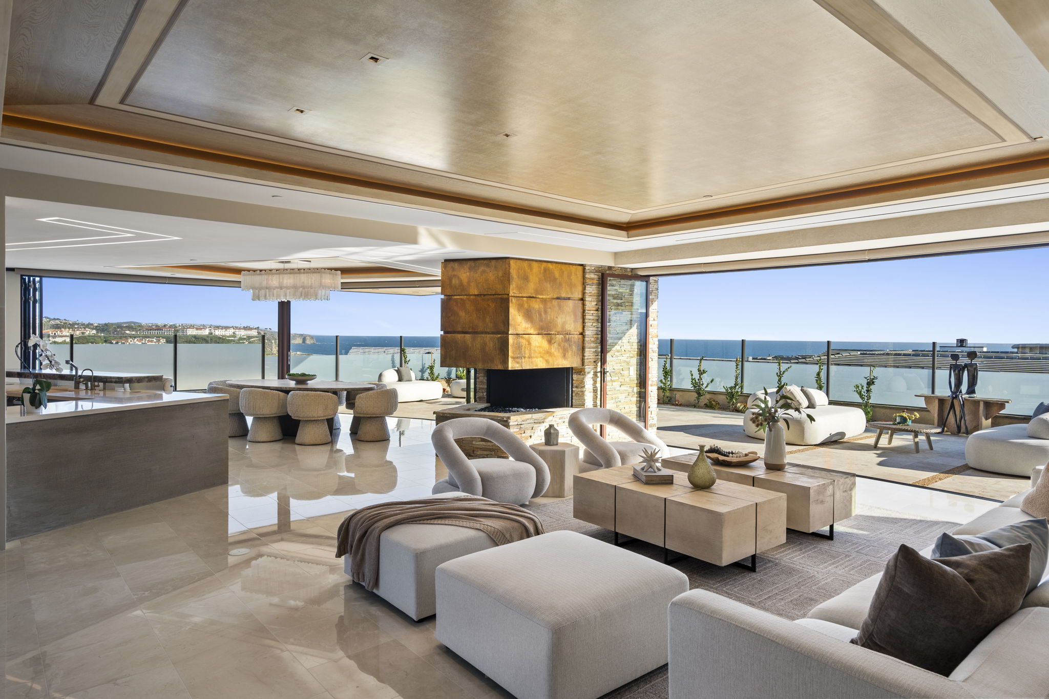 Living room with Nano bifold doors and ocean view