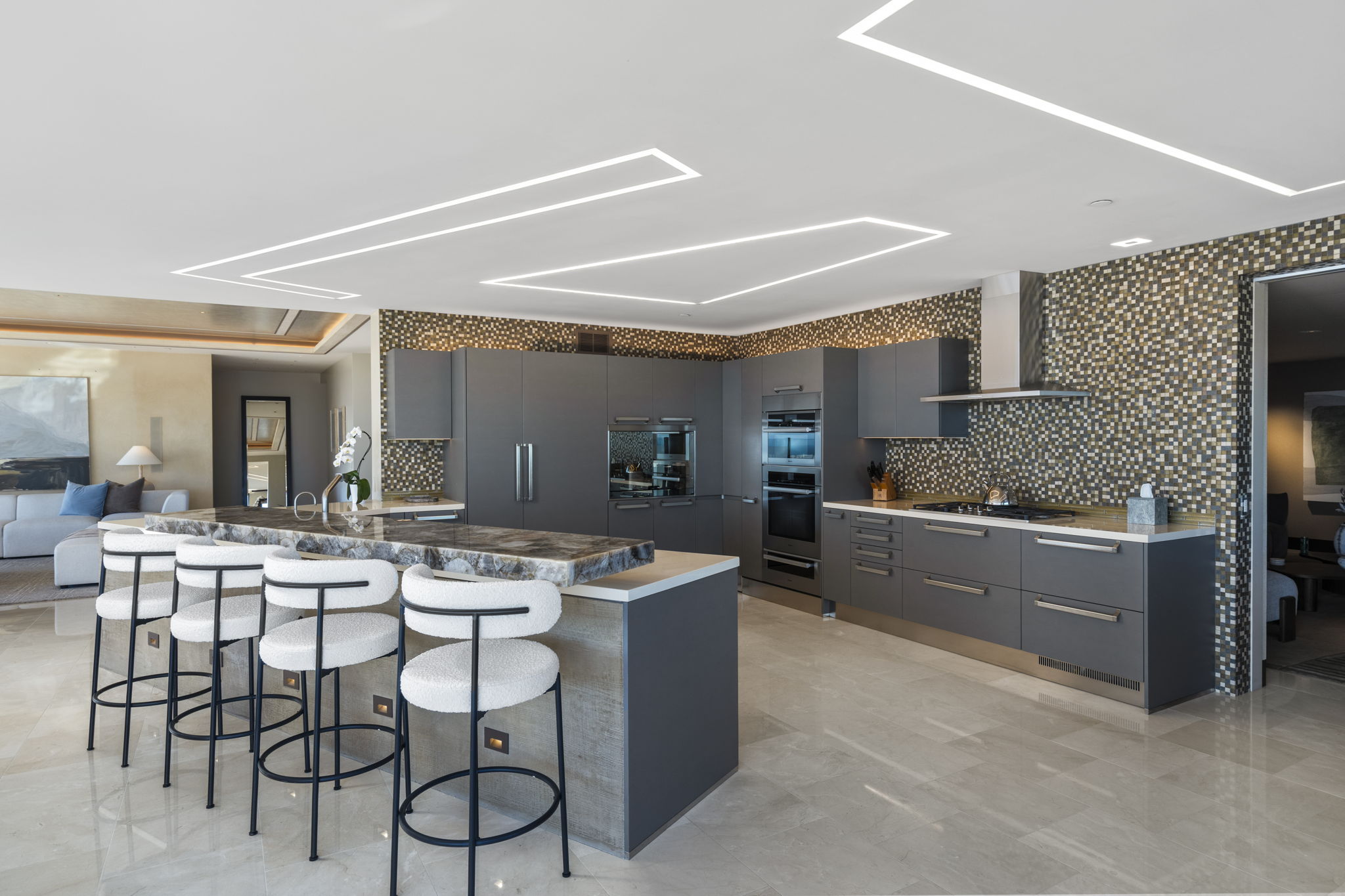 Chef's kitchen with quartz crystal island and Miele appliances