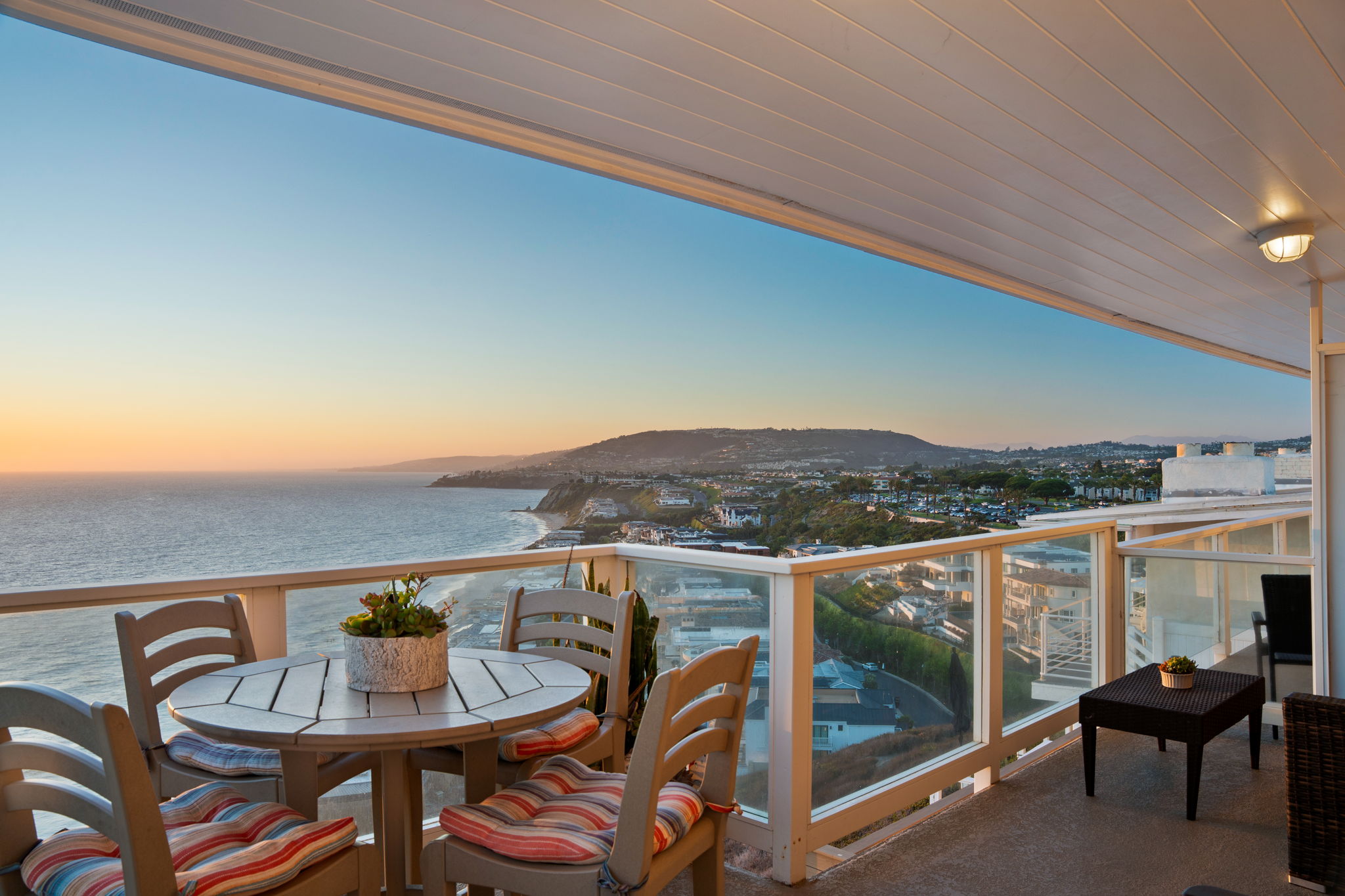 Sunset over the Pacific Ocean seen from Dana Point oceanfront condo balcony